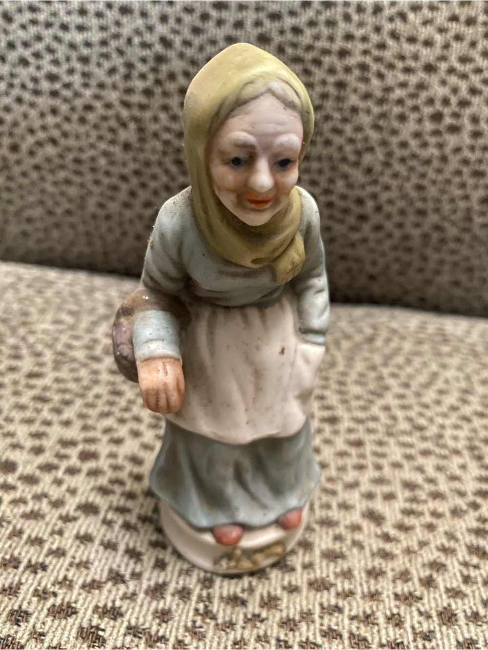 Hand-Painted Figurine of Elderly Woman in Pale Green Headscarf